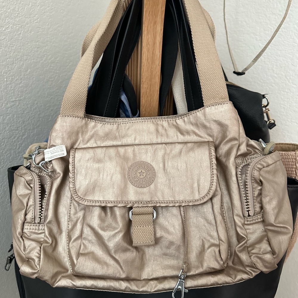 Gold Kipling purse